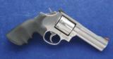 Smith & Wesson 686-5 on Lock, chambered in .357 Mag and manufactured in 2000. - 1 of 6