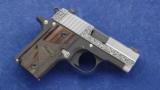 Sig Sauer P238 chambered in .380acp and was custom engraved by Russ Zima - 1 of 5