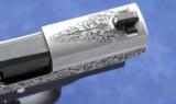 Sig Sauer P238 chambered in .380acp and was custom engraved by Russ Zima - 3 of 5