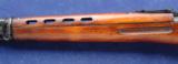 Russian SVT-40, chambered in 7.62X54R and was manufactured in 1943- 11 of 12