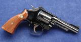 Smith & Wesson 15-3 K38 Combat Masterpice chambered in .38 spl. and manufactured in 1969. - 1 of 9
