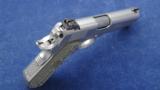 Ed Brown Stainless Kobra Carry and chambered in .45acp.
- 2 of 5