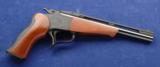 T/C Contender chambered in 45 Colt/.410 and manufactured in 1987 with Factory box. - 1 of 5