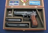 Beretta 92FS with both 9mm and 40 slides/barrels - 1 of 6