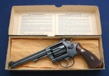 1948 S&W K22 in the gold box - 1 of 9
