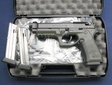 Used but hardly Beretta M9 .22LR w/Recover sleeve - 1 of 7
