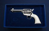 NIB 1994 nickel Colt SAA w/elephant ivory - 1 of 9