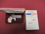 American Derringer Model Lady Derringer - NIB with papers and Factory Scrimshawed Grips - 1 of 4