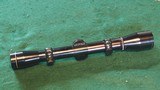 Leopold M8-4X scope with rings - 1 of 2