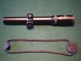Schmidt and Bender 1.25-4x20 rifle scope - 1 of 4