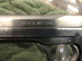 SMITH
&
WESSON
MODEL 41
TARGET PISTOL - 4 of 7
