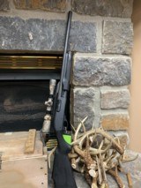 remington 870 express synthetic 12 ga pump action shotgun, 23" fully rifled heavy barrel, cantilever scope mount w/scope