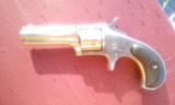 Remington-Smoot New Model No. 1, Nickel plated 95%, factory grips. - 1 of 4