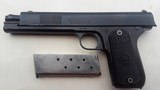 Colt Model 1902 civilian model with front slide serrations. #6035, no slide stop.
Very early production. - 1 of 9