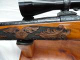 Weatherby Crown Grade Mark V 7mm Mag, Factory Engraved Bolt Action Rifle with Scope - 12 of 15