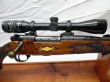Weatherby Crown Grade Mark V 7mm Mag, Factory Engraved Bolt Action Rifle with Scope - 1 of 15