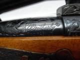 Weatherby Crown Grade Mark V 7mm Mag, Factory Engraved Bolt Action Rifle with Scope - 10 of 15