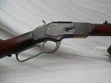 Winchester Model 1873 38 Cal WCF with a 24 inch Octagon Barrel Full Mag with a Crescent Butt - 1 of 15