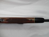 Winchester Model 70 Deluxe 270 with 22 "barrel, DOM 1973 with 4x12 Bushnell Banner Scope - 13 of 14
