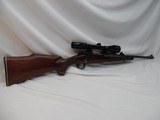 Winchester Model 70 Deluxe 270 with 22 "barrel, DOM 1973 with 4x12 Bushnell Banner Scope - 1 of 14