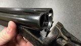 Churchill XXV shotgun.
Cased.
12g. - 14 of 15