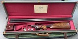 Daniel Fraser BLNE 12 bore shotgun.
Cased.
30" straight grip. - 1 of 15