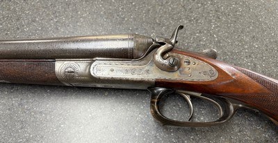 Ketner Hammer shotgun.
12g. Sauer action Damascus