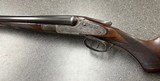 Lefever F grade 20g.
Early cocking rod gun.