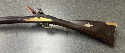 .54 caliber flintlock kibler woodsrunner rifle.
Custom finished.
Beautiful!