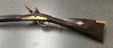 .54 caliber flintlock kibler woodsrunner rifle.
Custom finished.
Beautiful!