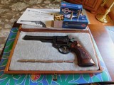 Excellent Smith & Wesson model 53 revolver 22 Rem. Jet Magnum 1st year 1961 w/2 boxs ammo. 100 rounds. - 1 of 20