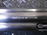 Smith and Wesson 617 No Dash Stainless Fingergroove Combats - 8 of 20