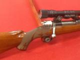 Belgium FN bolt action rifle with Bausch & Lomb scope 270 cal.
- 3 of 11