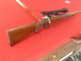 Belgium FN bolt action rifle with Bausch & Lomb scope 270 cal.
- 2 of 11