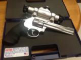 Smith & Wesson stainless model 617-6 6in 22lr 10 shot tasco pro point - 2 of 3