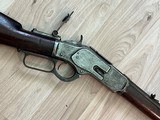 Original Winchester model 1873 with original tank site 32–20 caliber