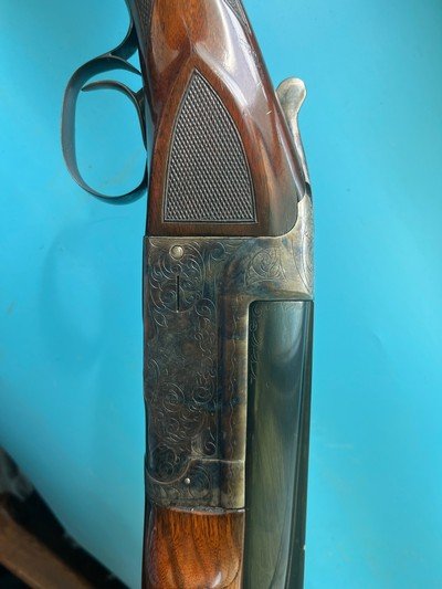 Beautiful engraved LC Smith single barrel trap gunadjusting stock