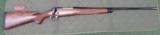 Winchester model 70 super grade 264 win mag - 1 of 3