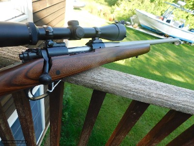 Winchester Model 70 Coyote 308 As New In Box With Papers and Scope Stainless With Wood Stock