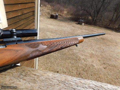 Winchester model 70 338 Win Mag Looks like custom shop gorgeous in near new condition Ready for you're elk, moose or bear hunt