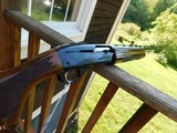 Remington 1100 Sporting 28 ga In NEAR NIB with all chokes Beautiful Wood 25