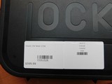 100% NEW IN BOX with all papers, lock, 3 mags and all accs. 9mm We also have a Glock V19 Same Price - 4 of 5