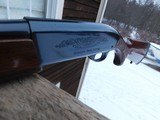 Remington 1100 Deer Gun With Factory Slug Barrel and sights - 11 of 12