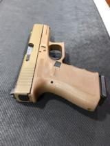 GLOCK 19RTF2 VICKERS TACTICAL 9MM FULL FDE
- 14 of 15
