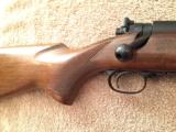 Winchester model 70 358 feather weight
- 2 of 12