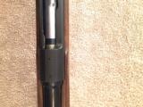 Winchester model 70 358 feather weight
- 4 of 12