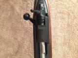 Winchester model 70 358 feather weight
- 3 of 12
