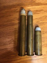 The cartridge group of unusual shells.
Winchester 50-95-with Hoxie bullet, WInchester 45 EX with Hoxie bullet, and UMCCo 50-140-700 PP Sharps - 1 of 4