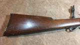 Maynard .22 long (not long rifle) with a second shot gun barrel that uses 20 gauge shells. - 12 of 14