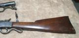 Maynard .22 long (not long rifle) with a second shot gun barrel that uses 20 gauge shells. - 13 of 14